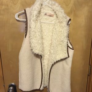 White fuzzy vest